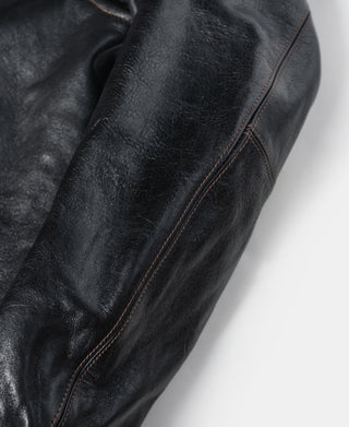 Black horsehide leather coat sleeve with curved contrast stitching