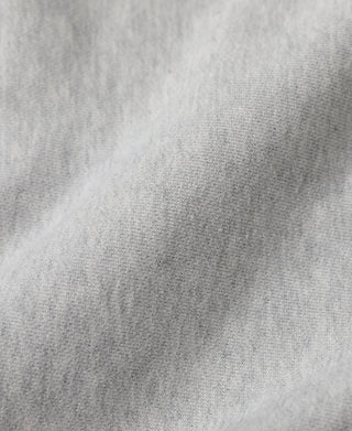 Gray reverse-weave sweatshirt knit fabric closeup