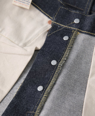 Indigo selvedge denim jeans, front fly with metal buttons and yellow seam