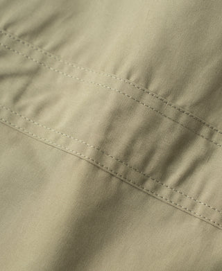 Khaki flight jacket horizontal panel stitching with reinforced seam lines