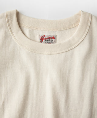 Apricot crew-neck t-shirt with inside label at collar