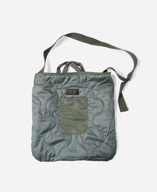 Olive square tote bag with front pocket panel and small logo patch