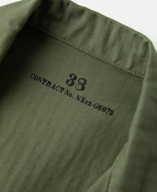 Olive jacket interior label with contract number 38