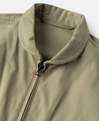 Khaki flight jacket collar and front zipper with metal pull tab
