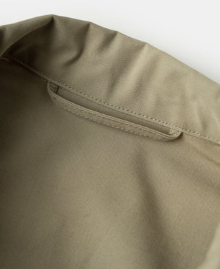Khaki flight jacket neck facing with top-stitch seam detail