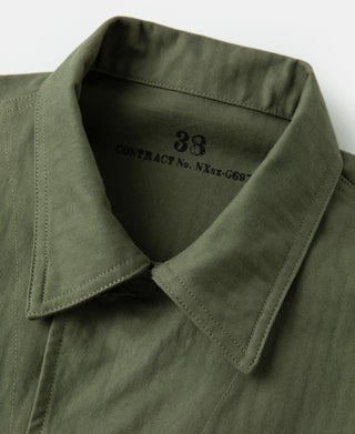 Olive jacket collar with 38 label and contract number on inner lining