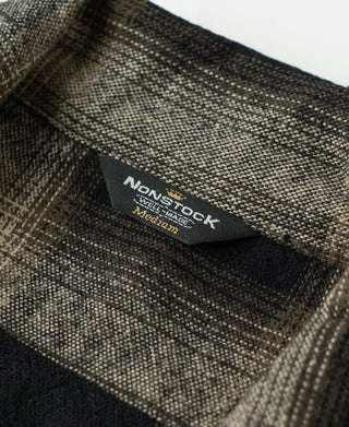 Brushed cotton ombre check sports shirt neck label and woven fabric texture in black and beige