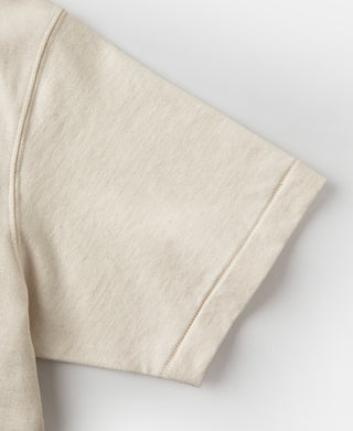 Apricot sleeve and side seam with reinforced stitching detail