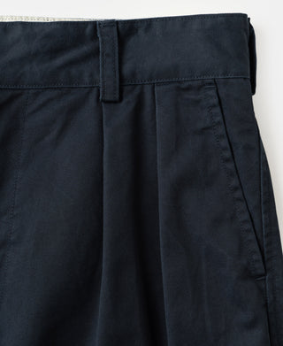 Navy trousers with belt loops, waistband tab, and vertical front pleat lines