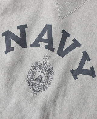 Gray crewneck sweatshirt with navy lettering and crest graphic