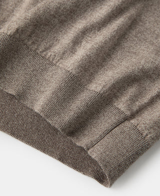Heathered brown ribbed cuff and hem detail on jersey knit