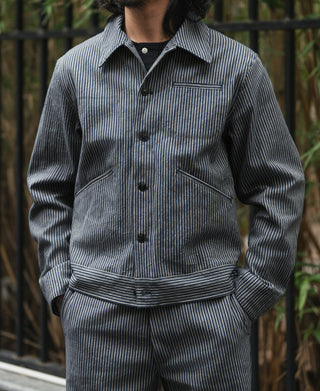 Striped cossack jacket with chest pockets and black button front, blue-and-cream stripes