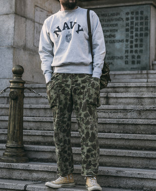 Gray crewneck sweatshirt with NAVY wordmark and crest on the back