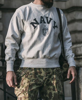 Gray sweatshirt back view with NAVY letters and crest graphic